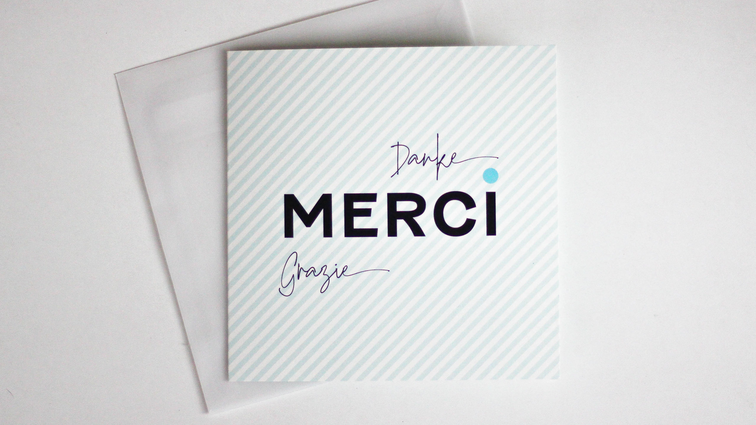 Carte "Merci, Danke, Grazie"